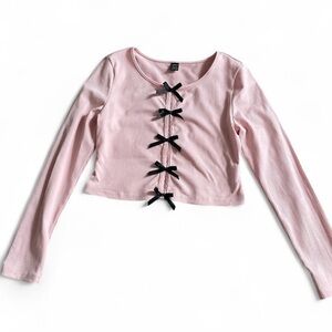 Coquette pastel pink crop top with black bows